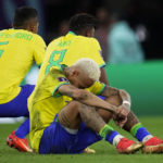 
              Neymar sits on the pith after Brazil's lost against Croatia in a penalty shootout in a World Cup quarterfinal soccer matchat the Education City Stad ium in Al Rayyan, Qatar, Friday, Dec. 9, 2022. (AP Photo/Manu Fernandez)
            