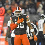 
              Cleveland Browns defensive end Myles Garrett celebrates after sacking Baltimore Ravens quarterback Tyler Huntley during the second half of an NFL football game, Saturday, Dec. 17, 2022, in Cleveland. (AP Photo/David Richard)
            
