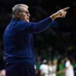 
              Connecticut head coach head coach Geno Auriemma calls a play during the first half of an NCAA college basketball game against Notre Dame on Sunday, Dec. 4, 2022, in South Bend, Ind. (AP Photo/Michael Caterina)
            