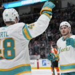 
              San Jose Sharks center Tomas Hertl (48) celebrates with right wing Timo Meier after scoring during the second period of an NHL hockey game against the Philadelphia Flyers in San Jose, Calif., Thursday, Dec. 29, 2022. (AP Photo/Jeff Chiu)
            