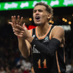 
              Atlanta Hawks guard Trae Young reacts after a no foul call during the first half of an NBA basketball game against the Orlando Magic, Monday, Dec. 19, 2022, in Atlanta. (AP Photo/Hakim Wright Sr.)
            