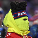 
              A Buffalo Bills fan watches the second half of an NFL football game between the Buffalo Bills and the Miami Dolphins in Orchard Park, N.Y., Saturday, Dec. 17, 2022. (AP Photo/Adrian Kraus)
            