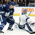 
              Tampa Bay Lightning goaltender Andrei Vasilevskiy stretches to stop Toronto Maple Leafs' John Tavares during the second period of an NHL hockey game, Tuesday, Dec. 20, 2022 in Toronto. (Chris Young/The Canadian Press via AP)
            