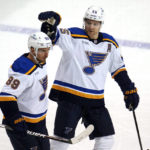 
              St. Louis Blues' Pavel Buchnevich (89) is congratulated by Colton Parayko (55) for a goal during the first period of the team's NHL hockey game against the Pittsburgh Penguins in Pittsburgh, Saturday, Dec. 3, 2022. (AP Photo/Gene J. Puskar)
            