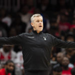 
              Chicago Bulls head coach Billy Donovan signals for a play during the first half of an NBA basketball game against the Atlanta Hawks, Sunday, Dec. 11, 2022, in Atlanta. (AP Photo/Hakim Wright Sr.)
            