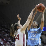 
              North Carolina's Teonni Key (13) shoots over Indiana's Mackenzie Holmes (54) during the first half of an NCAA college basketball game, Thursday, Dec. 1, 2022, in Bloomington, Ind. (AP Photo/Darron Cummings)
            