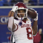 
              Arkansas tight end Ty Washington reacts after scoring on a 17-yard reception against Kansas during the first half of the Liberty Bowl NCAA college football game Wednesday, Dec. 28, 2022, in Memphis, Tenn. (AP Photo/Rogelio V. Solis)
            