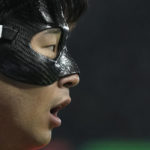 
              South Korea's Son Heung-min looks on during the World Cup group H soccer match between South Korea and Portugal, at the Education City Stadium in Al Rayyan , Qatar, Friday, Dec. 2, 2022. (AP Photo/Hassan Ammar)
            