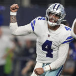 
              Dallas Cowboys quarterback Dak Prescott (4) reacts after a pass was ruled incomplete during the second half of an NFL football game against the Houston Texans, Sunday, Dec. 11, 2022, in Arlington, Texas. (AP Photo/Tony Gutierrez)
            