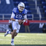 
              Duke quarterback Riley Leonard (13) runs the ball during the first half of the Military Bowl NCAA college football game against UCF, Wednesday, Dec. 28, 2022, in Annapolis, Md. (AP Photo/Terrance Williams)
            