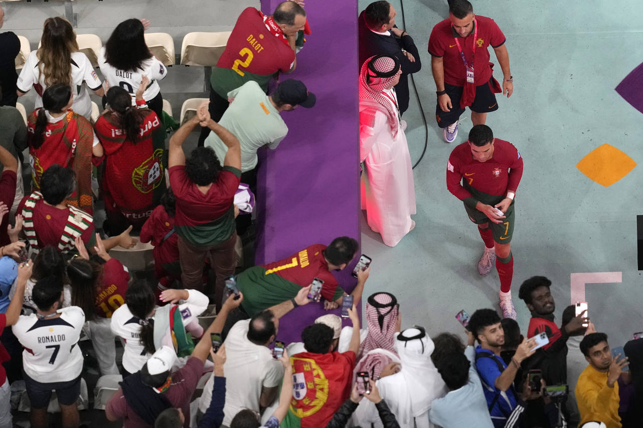 Portugal's Cristiano Ronaldo walks out from the pitch after the World Cup round of 16 soccer match ...