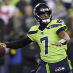 
              Seattle Seahawks quarterback Geno Smith (7) passes against the San Francisco 49ers during the first half of an NFL football game in Seattle, Thursday, Dec. 15, 2022. (AP Photo/Marcio Jose Sanchez)
            