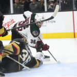 
              Arizona Coyotes right wing Christian Fischer scores a goal against Vegas Golden Knights goaltender Logan Thompson during the third period of an NHL hockey game Wednesday, Dec. 21, 2022, in Las Vegas. (AP Photo/Chase Stevens)
            