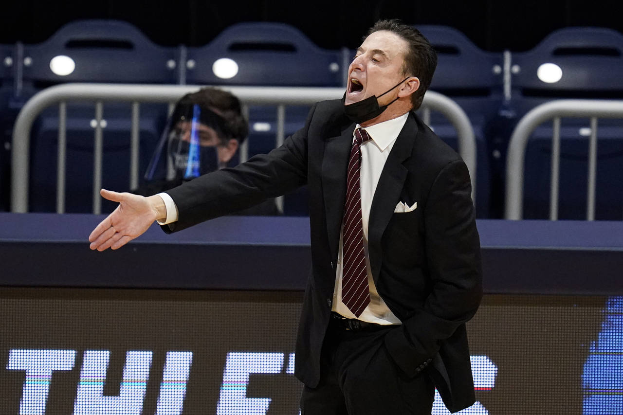 FILE - Iona head coach Rick Pitino gestures as his team plays against Alabama in the first half of ...