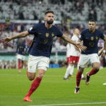 
              France's Olivier Giroud, left, celebrates with France's Kylian Mbappe, after scoring the opening goal during the World Cup round of 16 soccer match between France and Poland, at the Al Thumama Stadium in Doha, Qatar, Sunday, Dec. 4, 2022. (AP Photo/Ebrahim Noroozi)
            