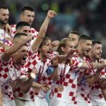 
              Croatia players celebrate at the end of the World Cup third-place playoff soccer match between Croatia and Morocco at Khalifa International Stadium in Doha, Qatar, Saturday, Dec. 17, 2022. (AP Photo/Frank Augstein)
            