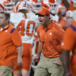 
              Clemson coach Dabo Swinney encourages players before the team's Orange Bowl NCAA college football game against Tennessee, Friday, Dec. 30, 2022, in Miami Gardens, Fla. (AP Photo/Rebecca Blackwell)
            