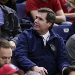 
              FILE - Gonzaga President Thayne McCulloh sits in the stands before an NCAA college basketball game between Gonzaga and Texas Southern in Spokane, Wash., Friday, Nov. 10, 2017. There’s nothing else in West Coast college basketball to rival what Gonzaga has created over the last two decades. “I am an undergrad degree-holder of the institution and so have been part of it for over 35 years and I’ve seen sort of what it was before we have experienced the modern era of basketball and what it has been during that time,” Gonzaga President McCulloh said. (AP Photo/Young Kwak, File)
            