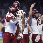 
              New Mexico State running back Star Thomas, left, and quarterback Diego Pavia (10) celebrate after Thomas' pass reception touchdown against Bowling Green during the first half of the Quick Lane Bowl NCAA college football game, Monday, Dec. 26, 2022, in Detroit. (AP Photo/Al Goldis)
            