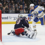 
              Buffalo Sabres' Tage Thompson, right, scores a goal against Columbus Blue Jackets' Elvis Merzlikins during the first period of an NHL hockey game Wednesday, Dec. 7, 2022, in Columbus, Ohio. (AP Photo/Jay LaPrete)
            