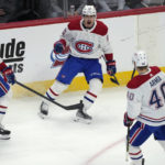
              Montreal Canadiens center Anthony Richard, center, celebrates after scoring a goal with defenseman Arber Xhekaj, left, and right wing Joel Armia in the first period of an NHL hockey game against the Colorado Avalanche Wednesday, Dec. 21, 2022, in Denver. (AP Photo/David Zalubowski)
            