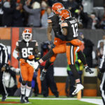 
              Cleveland Browns' Donovan Peoples-Jones, center left, celebrates his touchdown with Michael Woods II during the second half of an NFL football game against the Baltimore Ravens, Saturday, Dec. 17, 2022, in Cleveland. (AP Photo/Ron Schwane)
            