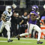 
              Minnesota Vikings running back Dalvin Cook (4) runs from Indianapolis Colts safety Rodney McLeod (26) during a 64-yard touchdown reception during the second half of an NFL football game, Saturday, Dec. 17, 2022, in Minneapolis. (AP Photo/Abbie Parr)
            