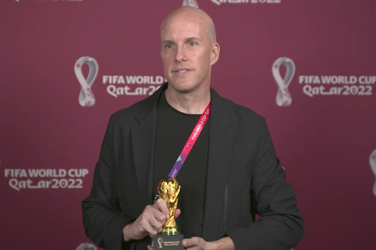 A screenshot taken from video provided by FIFA of journalist Grant Wahl at an awards ceremony in Do...
