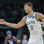 
              Milwaukee Bucks center Brook Lopez (11) celebrates after a 3-point basket during the second half of the team's NBA basketball game against the Charlotte Hornets on Saturday, Dec. 3, 2022, in Charlotte, N.C. (AP Photo/Scott Kinser)
            