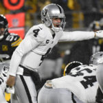 
              Las Vegas Raiders quarterback Derek Carr (4) calls signals during the first half of an NFL football game against the Pittsburgh Steelers in Pittsburgh, Saturday, Dec. 24, 2022. (AP Photo/Don Wright)
            