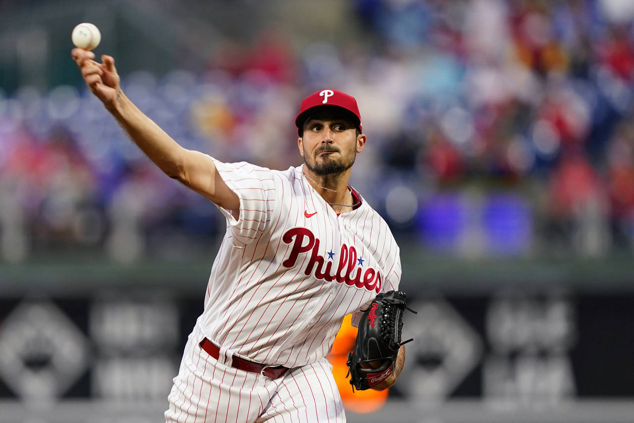 FILE - Philadelphia Phillies' Zach Eflin pitches during the first inning of the team's baseball gam...