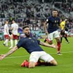 
              FILE - France's Olivier Giroud celebrates after scoring the opening goal during the World Cup round of 16 soccer match between France and Poland, at the Al Thumama Stadium in Doha, Qatar, Sunday, Dec. 4, 2022. (AP Photo/Ebrahim Noroozi, File)
            