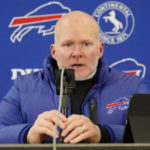 
              Buffalo Bills head coach Sean McDermott talks with reporters after an NFL football game against the Chicago Bears Saturday, Dec. 24, 2022, in Chicago. The Bills won 35-13 and McDermott had to tell the team they were staying one more night in Chicago because of weather in Buffalo. (AP Photo/Charles Rex Arbogast)
            