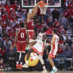 
              Indiana forward Trayce Jackson-Davis (23) dunks against Arizona during the second half of an NCAA college basketball game Saturday, Dec. 10, 2022, in Las Vegas. (AP Photo/Chase Stevens)
            