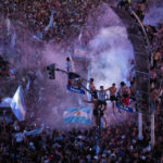 
              Argentine soccer fans celebrate their team's World Cup victory over France in downtown Buenos Aires, Argentina, Sunday, Dec. 18, 2022. (AP Photo/Rodrigo Abd)
            