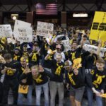 
              Missouri fans cheer as their team warms up before the start of an NCAA college basketball game against Kansas Saturday, Dec. 10, 2022, in Columbia, Mo. (AP Photo/L.G. Patterson)
            