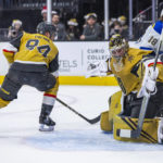 
              Vegas Golden Knights goaltender Logan Thompson (36) stops a St. Louis Blues shot during the first period of an NHL hockey game Friday, Dec. 23, 2022, in Las Vegas. (AP Photo/L.E. Baskow)
            