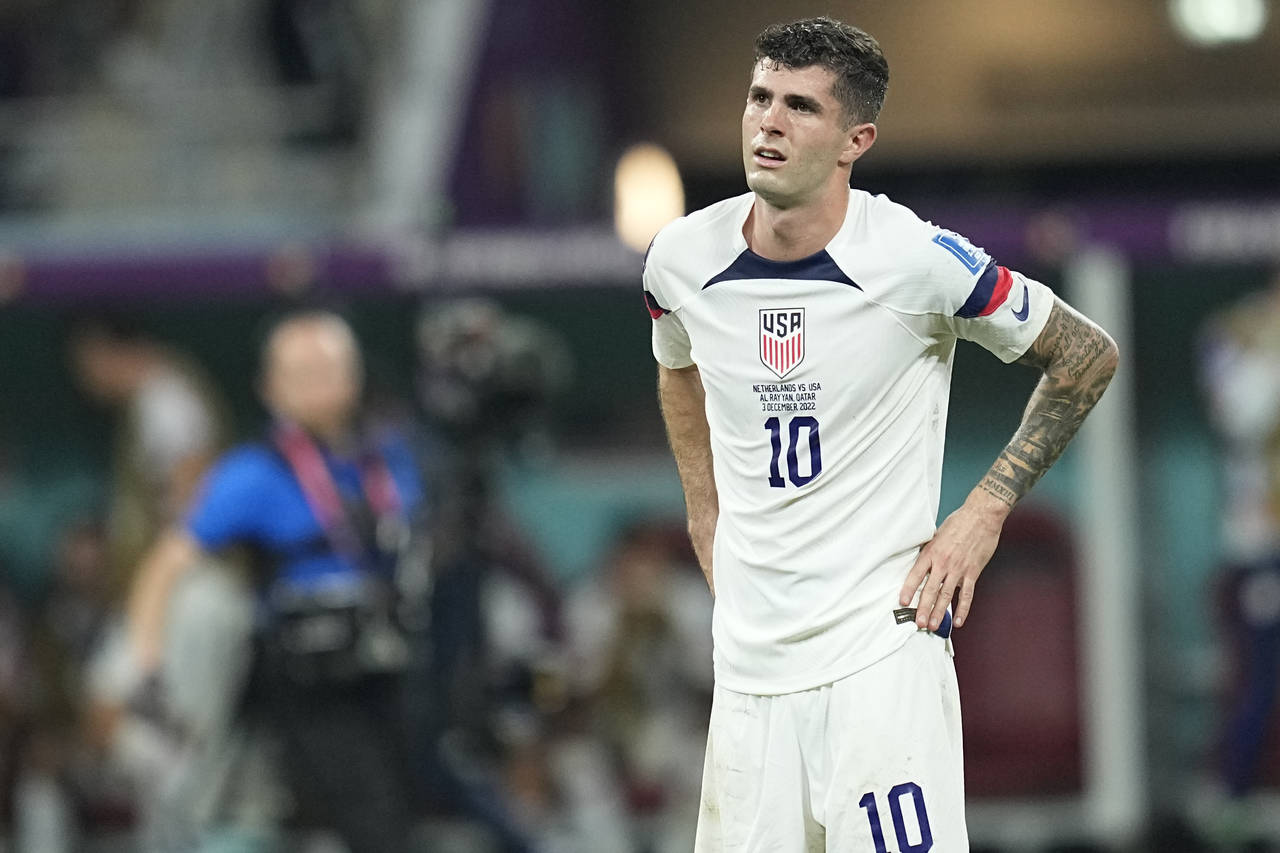 Christian Pulisic of the United States is dejected after the World Cup round of 16 soccer match bet...