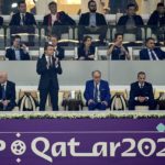 
              FILE - French President Emmanuel Macron applauds after the World Cup semifinal soccer match between France and Morocco at the Al Bayt Stadium in Al Khor, Qatar, on Dec. 14, 2022. Macron is about to jet off to Qatar for the second time in a week, despite broad concerns about the emirate's human rights and environmental record. Why? Because France is in the World Cup final, and Macron really is a big football fan — as well as a prominent advocate of the longstanding partnership between the two countries. (AP Photo/Martin Meissner, File)
            