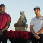 
              Tiger Woods, left, and Viktor Hovland, of Norway, pose for a photo after he winning the Hero World Challenge PGA Tour at the Albany Golf Club, in New Providence, Bahamas, Sunday, Dec. 4, 2022. (AP Photo/Fernando Llano)
            