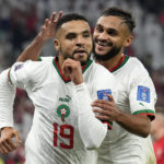 
              Morocco's Youssef En-Nesyri, left, celebrates beside Morocco's Sofiane Boufal, right, after he scored his side's second goal during the World Cup group F soccer match between Canada and Morocco at the Al Thumama Stadium in Doha , Qatar, Thursday, Dec. 1, 2022. (AP Photo/Natacha Pisarenko)
            