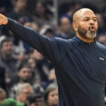 
              Cleveland Cavaliers coach J.B. Bickerstaff instructs players during the first half of the team's NBA basketball game against the Sacramento Kings, Friday, Dec. 9, 2022, in Cleveland. (AP Photo/Nick Cammett)
            