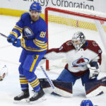 
              Buffalo Sabres right wing Alex Tuch (89) looks to tip the puck past Colorado Avalanche goaltender Alexandar Georgiev (40) during the third period of an NHL hockey game, Thursday, Dec. 1, 2022, in Buffalo, N.Y. (AP Photo/Jeffrey T. Barnes)
            