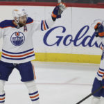 
              Edmonton Oilers center Leon Draisaitl (29) celebrates with defenseman Evan Bouchard (2) after Draisaitl scored against the Minnesota Wild during the first period of an NHL hockey game Thursday, Dec. 1, 2022, in St. Paul, Minn. (AP Photo/Stacy Bengs)
            