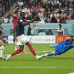 
              France's Randal Kolo Muani scores his side's second goal during the World Cup semifinal soccer match between France and Morocco at the Al Bayt Stadium in Al Khor, Qatar, Wednesday, Dec. 14, 2022. (AP Photo/Francisco Seco)
            