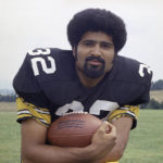 
              FILE - Pittsburgh Steelers running back Franco Harris is shown in 1973. Franco Harris, the Hall of Fame running back whose heads-up thinking authored “The Immaculate Reception,” considered the most iconic play in NFL history, died Wednesday, Dec. 21, 2022. He was 72. (AP Photo/Harry Cabluck, File)
            