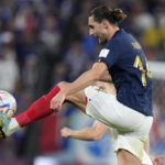 
              France's Adrien Rabiot controls the ball during the World Cup round of 16 soccer match between France and Poland, at the Al Thumama Stadium in Doha, Qatar, Sunday, Dec. 4, 2022. (AP Photo/Natacha Pisarenko)
            