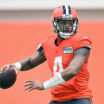 
              Cleveland Browns quarterback Deshaun Watson looks to pass during an NFL football practice at the team's training facility Wednesday, Nov. 30, 2022, in Berea, Ohio. (AP Photo/David Richard)
            