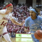 
              North Carolina's Kennedy Todd-Williams, right, goes to the basket against Indiana's Sara Scalia (14) during the first half of an NCAA college basketball game, Thursday, Dec. 1, 2022, in Bloomington, Ind. (AP Photo/Darron Cummings)
            