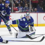 
              Vancouver Canucks goalie Spencer Martin gives up a goal to Florida Panthers' Sam Bennett during the second period of an NHL hockey game Thursday, Dec. 1, 2022, in Vancouver, British Columbia. (Darryl Dyck/The Canadian Press via AP)
            
